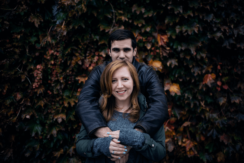Chris and Katie in front of some leaves